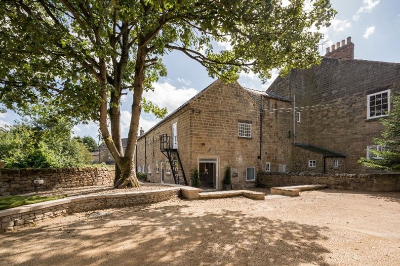 Derbyshire mill ravaged by fire reopens as office space